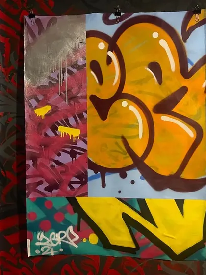 A canvas piece from an exhibition, showing a mix of graffiti styles. It combines a bubble-style 'throw-up' with more abstract textures and my signature, all on one canvas.
