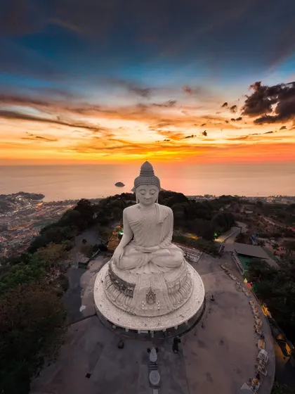 Capturing the peace of a fiery sunset over the Big Buddha in Phuket, Thailand. My international trips are about finding these moments of calm and beauty in incredible places.