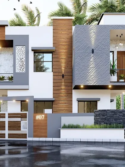 A residential project in Shreerampura with a balanced composition of geometric shapes. The design features a cantilevered balcony, decorative jaali screen, and a mix of grey textured stone and wood panels.