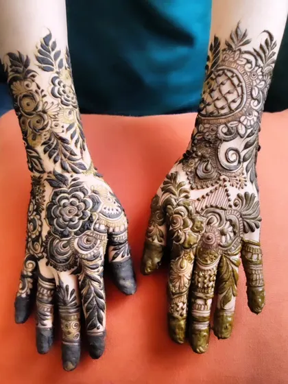 A stunning design with a mix of floral and geometric patterns, creating a rich and textured look.