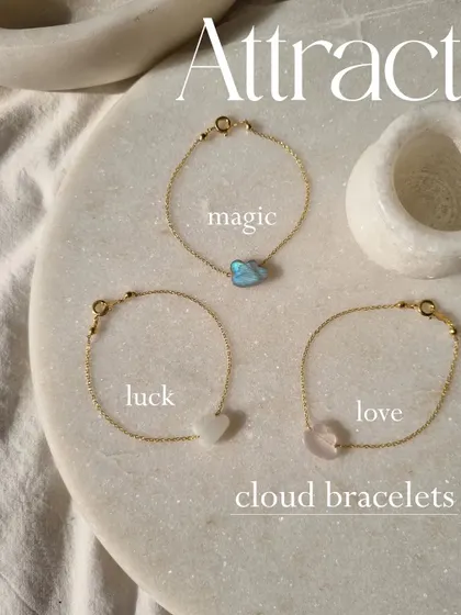 A collection of my cloud bracelets: Labradorite for magic, Moonstone for luck, and Rose Quartz for love.