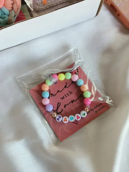 A "Made with Love" name bracelet for Zara, individually packaged and ready to be included in a gift hamper.