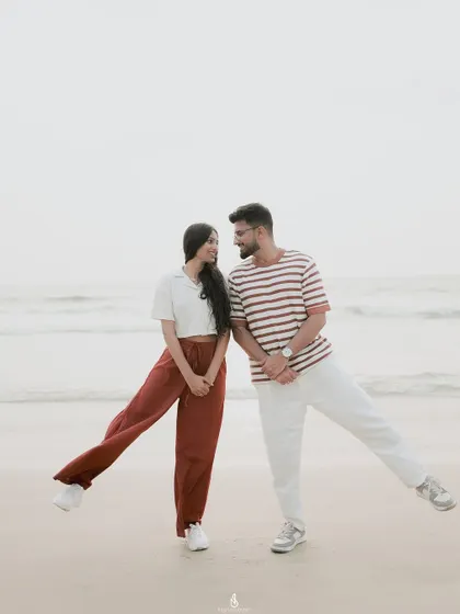 A quirky and fun pose on the sand. I always encourage couples to bring their unique personalities to the shoot.