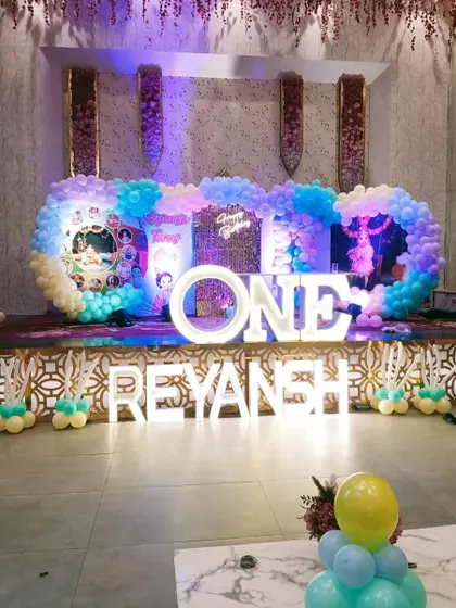 This Cocomelon-themed first birthday for Reyansh shows how I can create a fun and vibrant stage. The large "ONE" and name marquee letters are always a favorite for photos.