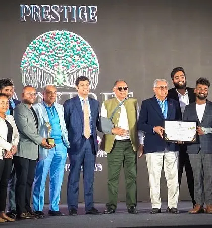 On stage with the Next Footstep team, being recognized by the Prestige Group. Our collective effort and expertise are what make us a leading real estate consultancy in Bangalore.