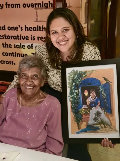 This is why I do what I do. Seeing the joy on a client's face when they receive a custom piece of art that captures a precious memory is the most rewarding part of my work. This personalized portrait was a gift, turning a cherished photo into a timeless keepsake.