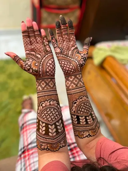 This is the final stained result of a classic bridal design. The color is deep and even, ensuring it looks perfect for your wedding photos.