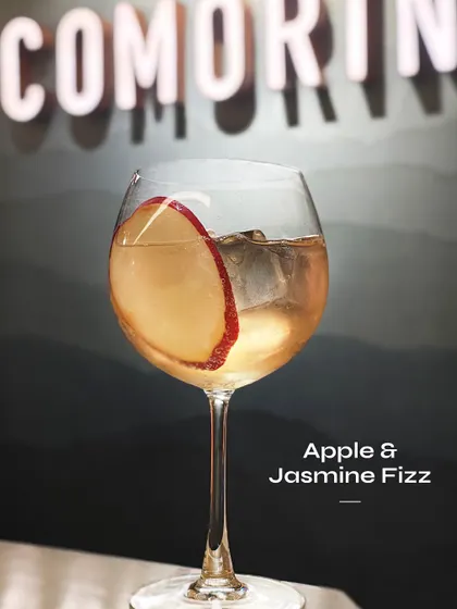 The Apple & Jasmine Fizz, a crisp and aromatic sparkling cocktail.