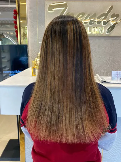 Another look at a sleek hair transformation. The color is vibrant, and the hair is incredibly smooth and shiny.