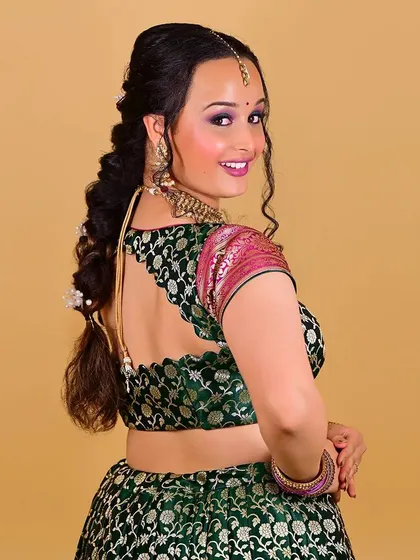 A duplicate of 125, this image again highlights the beautiful back details and the complementary hair and makeup.