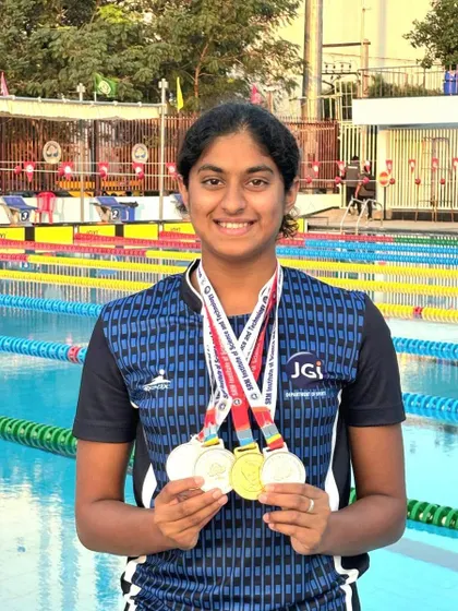 Ashmitha Chandra, a key member of our swimming family, displays her one gold and three silver medals from the South West Inter University Championship.