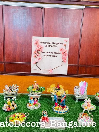 This image showcases a variety of my platter designs arranged together for a function. You can see the pineapple groom, decorated coconuts, and fruit baskets all in one display.