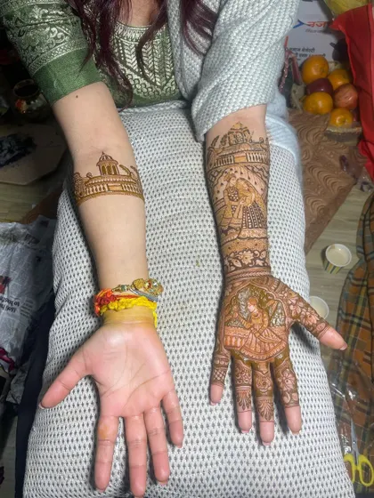 A work in progress. One arm is complete with a beautiful story design, while the other is ready for its matching artwork.
