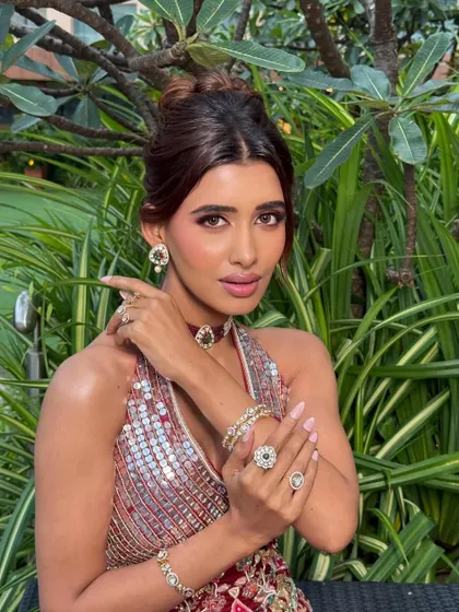 Our modern-day Garba Night look is for the bride who celebrates every moment like a festival. This look blends tradition with modern glamour for an unforgettable night.