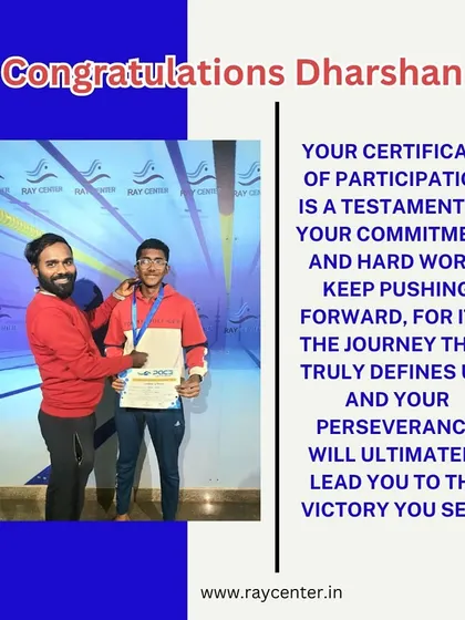 A coach awards Darshan his certificate, recognizing his commitment and hard work in the competition.