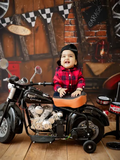 Let's have some fun! I offer a wide range of creative and themed photoshoots, like this cool little biker setup, complete with a miniature Royal Enfield.