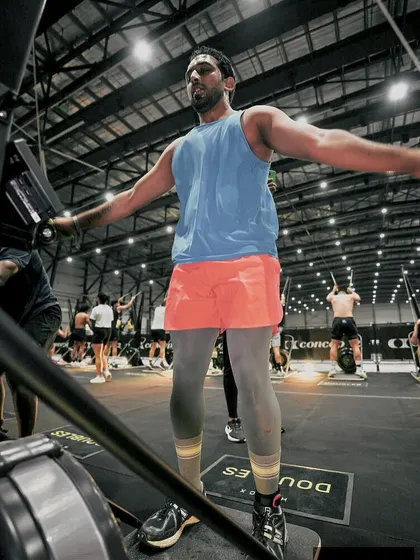 On the SkiErg at Hyrox Mumbai. This machine works your entire body and is a huge cardiovascular challenge.