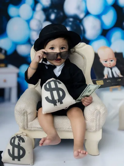 Adjusting his shades like a true boss. The details and props are what make these sessions so special.