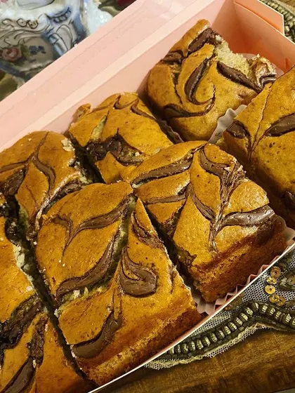 This Banana Nutella swirl cake is one of my favorite tea time treats. The combination of moist banana bread and rich Nutella swirls is absolutely delicious.