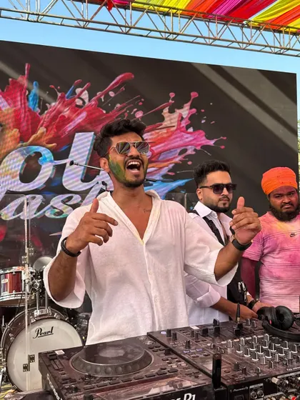 The 2025 Holi party was a blast of colors and energy. This shot captures me hyping up the crowd, with everyone covered in colors and having an amazing time.