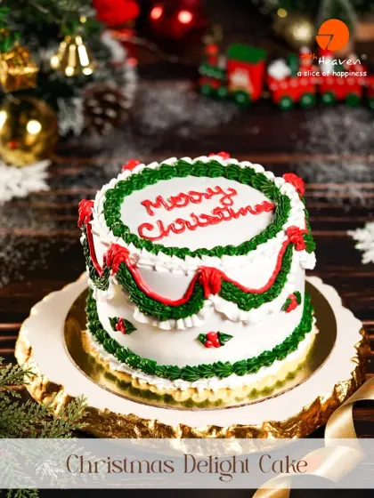 Our Christmas Delight Cake is a classic holiday treat. This two-tiered white cake is decorated with traditional red and green frosting, wishing everyone a Merry Christmas.