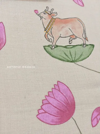 Detail of the sacred cow from the Pichwai mural. The gentle shading and delicate posture are key elements of this traditional Rajasthani art form.