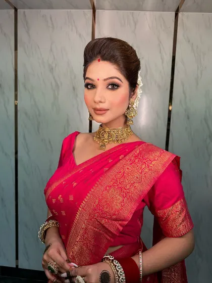 A portrait of the bride, her bindi and our temple choker completing her classic Indian look.