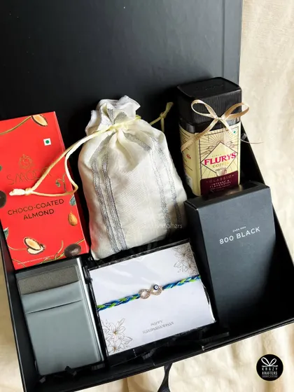 A full view of the sophisticated 'Rakhi Reserve' hamper, packed in a sleek black box.