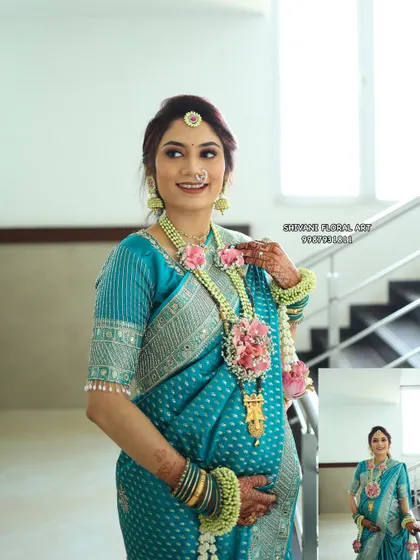 A lovely mom-to-be wearing a fresh floral set with delicate pink carnations. The jewellery is designed to be lightweight and comfortable while still looking beautiful.