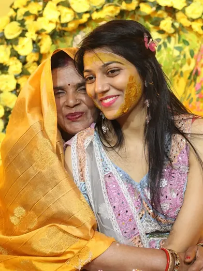 Some of the best shots are the quiet ones. Here, a mother shares a warm, loving embrace with her daughter during the Haldi ceremony. I focus on capturing these genuine family connections amidst the celebration.