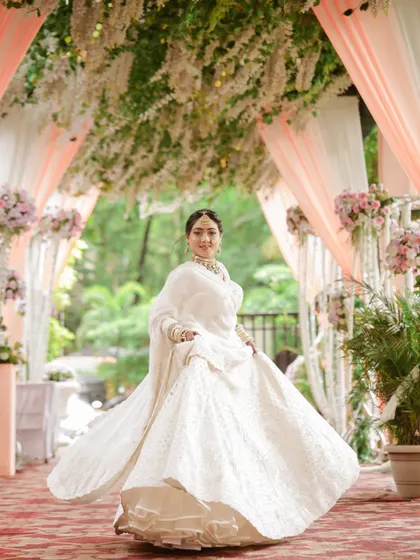 A joyful twirl! We always encourage our brides to have fun and move around, which results in dynamic and happy photos like this one.