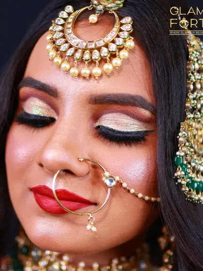 A detailed close up of the Valima eye makeup. I used a cut-crease technique with silver and gold glitter to create this dramatic and beautiful effect.