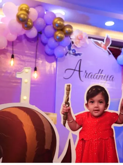 A close-up of the birthday girl enjoying her Sofia the First party. Our setups are designed to be interactive and fun for the little ones.