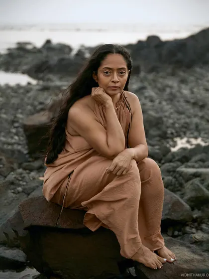 A pensive and powerful portrait from the same series. The overcast light creates a soft, moody atmosphere that enhances the emotional depth of the image.
