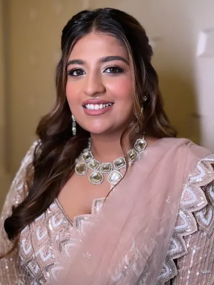 A close-up of the engagement glam. The focus is on glowing skin and softly defined eyes, creating a look that is both modern and timeless.