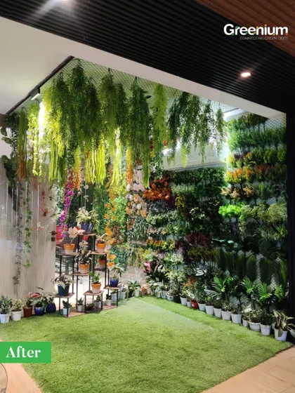 This unique setup shows how to create a green oasis even in a small indoor corner. I used a combination of a vertical wall, floor planters, and hanging elements to build a fully immersive green experience.