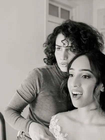 A candid black and white shot of the big reveal. That look of happy surprise on the bride's face is the reason I love my job.