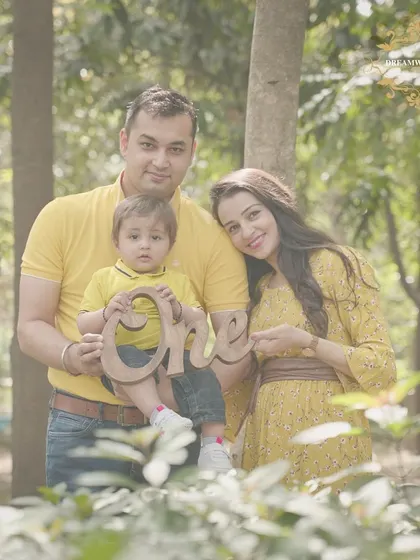 An outdoor family photoshoot celebrating a first birthday and a new baby on the way. We love capturing these milestones for growing families in natural, beautiful settings.