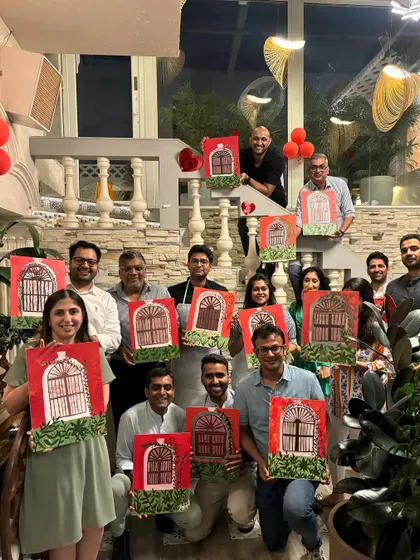 The team from Isprava holding up their finished Portuguese window paintings. I love seeing how each person adds their own unique touch to the same theme.