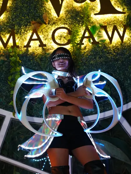 A futuristic look with LED fans and wings at Macaw by Stories. I will not fall, I will stand tall.