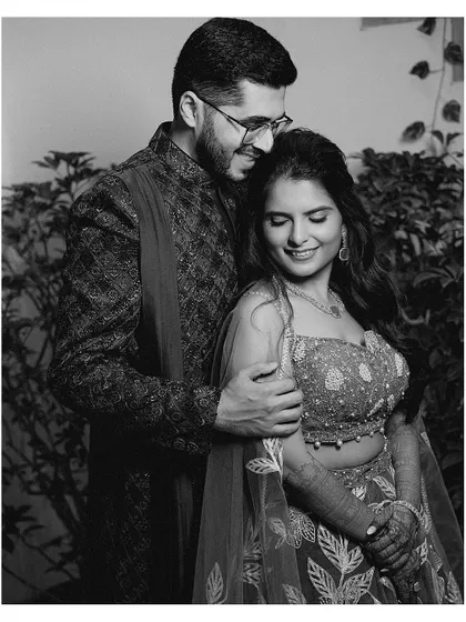 A classic black and white portrait of the couple on their Sangeet night.