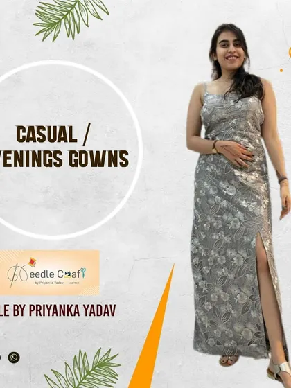 This grey embroidered gown with a thigh-high slit is perfect for a summer evening event. It’s elegant, modern, and designed for a perfect fit.
