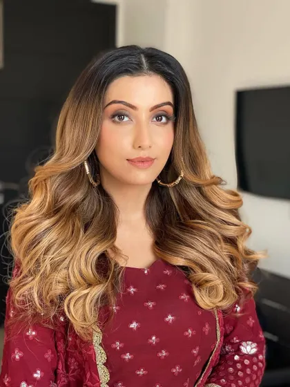 These soft, outward-facing curls create such an elegant and polished look. This style, taught in my online class, gets its beautiful shape and volume from a carefully placed set of extensions.