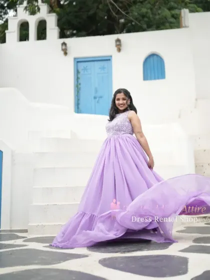 The lavender gown in motion, showing how the lightweight skirt and trail flow beautifully as you walk.
