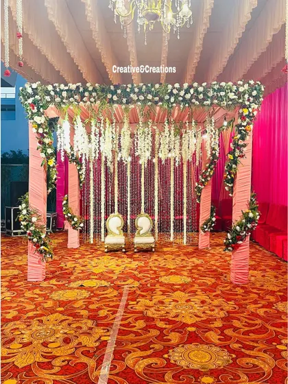 A front view of the elegant mandap, perfectly centered and ready for the wedding ceremony.
