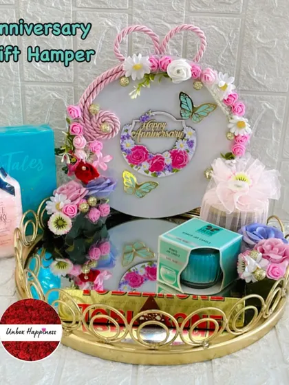Another angle of the decorative anniversary gift tray, highlighting the floral arrangement and butterfly accents.