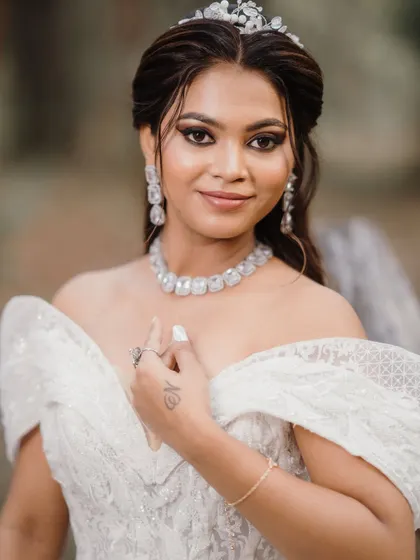 A direct and smiling pose of the same Christian bridal look, showing how it radiates beauty and happiness.