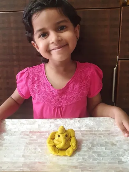 Look at the pride and joy in their creations! For Ganesh Chaturthi, children used various materials like clay, leaves, and paper to create their own Ganesha figures. This is a wonderful fusion of art, culture, and personal expression.