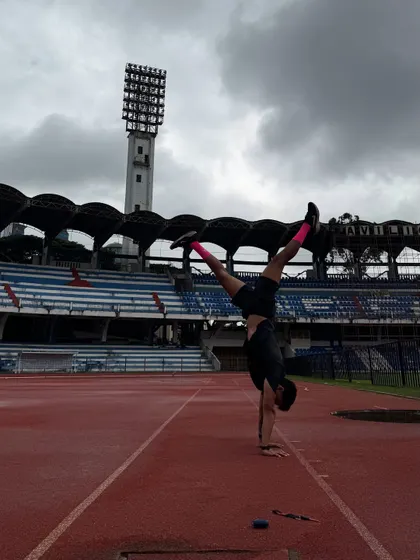 Same drills, different day. Here I am practicing my handstand on a running track. Consistency is what makes the skill start to click, no matter where you are.