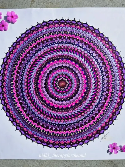 The full 2x2 feet magenta mandala, a labor of love that required many hours of patient, detailed work.